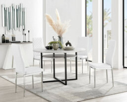 Furniturebox Adley Grey Concrete Effect And Black Round Dining Table With Storage Shelf And 4 White And Silver Milan Modern Faux Leather Chairs