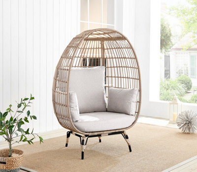 Furniturebox Uk Beige Rattan Garden Egg Chair In Pe Resin Rattan For Outdoors And 15Cm Luxuriously Thick Taupe Cushions - image 1
