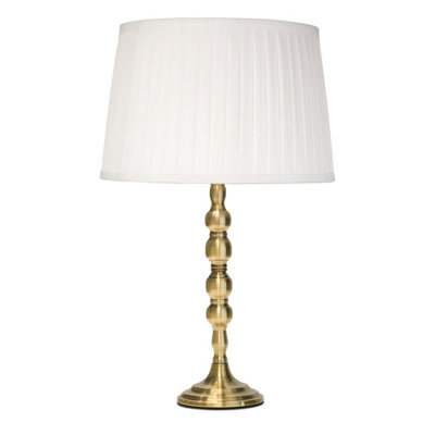 Lighting Supermarket Bergen Slimline Antique Brass Candlestick Table Lamp With Ivory Pleated Shade - image 1