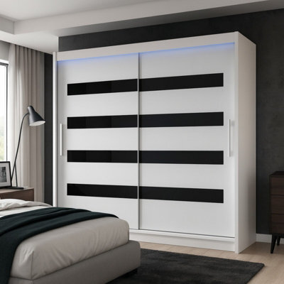 Bega Xi 180 Wardrobe With Sliding Doors Hanging Rail Shelves White With Black And Led Lights - image 1
