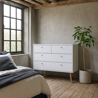 Wyld Haus Quietbloom White 4-Drawer Wooden Chest With Oak Legs - image 1