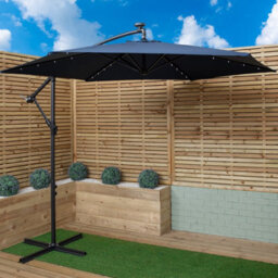 Samuel Alexander Outdoor 4 Person Round Glass Top Garden Dining Table Chairs With Blue Banana Lit Parasol And Base Set - thumbnail 2