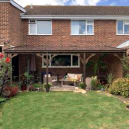 Rutland County Garden Furniture Wall Mounted Polycarbonate Roof Gazebo - Rustic Brown - 4.5M Depth X 7.22M Width - 4 Posts / Brown Glazing Bars / Opal Sheets - thumbnail 9