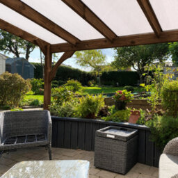 Rutland County Garden Furniture Wall Mounted Polycarbonate Roof Gazebo - Rustic Brown - 4.5M Depth X 7.22M Width - 4 Posts / Brown Glazing Bars / Opal Sheets - thumbnail 5