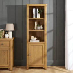 The Furniture Market Cotswold Rustic Smoked Oak Tall Narrow Bookcase With 1 Door Cupboard - thumbnail 1