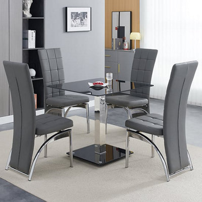 Furniture In Fashion Hartley Black Glass Bistro Dining Table 4 Ravenna Grey Chairs - image 1