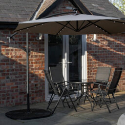 Samuel Alexander Outdoor 4 Person Round Glass Top Garden Dining Table Chairs With Grey Banana Lit Parasol And Base Set