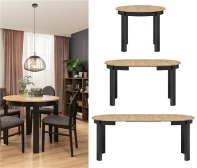 Impact Furniture Round Dining Table Extendable Oval Oak Effect Top Black Legs Seats 4 6 8 10 12 Extending From 105Cm To 240Cm Indus - image 1
