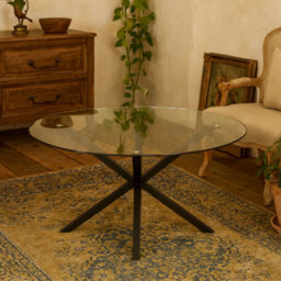 Wyld Haus Saignon 1200mm Round Glass Dining Table With Black Cross-Leg Metal Base - thumbnail 2