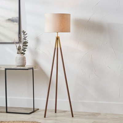 Pacific Lifestyle Gold Metal And Wood Grain Tripod Floor Lamp - image 1