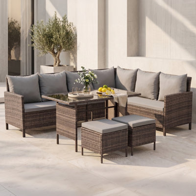 Evre Madison 8 Seater Rattan Garden Furniture Set, Brown Corner Sofa With Glass Dining Table, 2 Stools & Cushions - image 1
