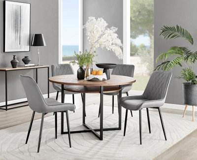 Furniturebox Adley Brown Wood Effect And Black Round Dining Table With Storage Shelf And 4 Grey Velvet Black Leg Pesaro Dining Chairs - image 1