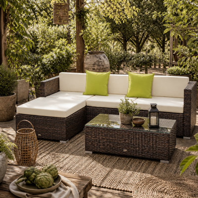 Wyld Haus Milo 4-Seater Brown Rattan Outdoor Corner Sofa Set With Cream Cushions And Tea Table - image 1