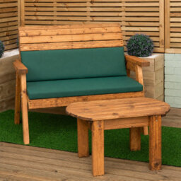 Samuel Alexander 2 Seater Chunky Rustic Wooden Garden Furniture Bench With Coffee Table & Green Cushions - thumbnail 1