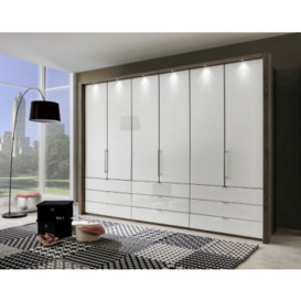 Loft 6 Door 9 Drawer Bi Fold Wardrobe in Oak and Pebble Grey Glass - W 300cm - thumbnail 1