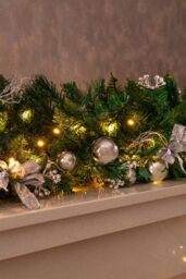 Marco Paul 6ft Pre-Lit LED Christmas Garland With Silver Bows & Baubles in Green - thumbnail 2