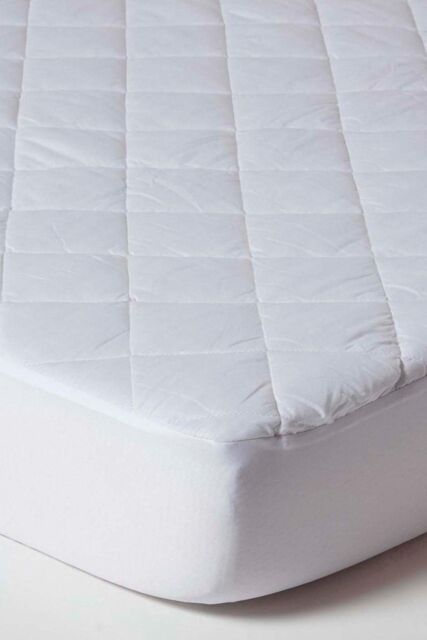 Homescapes Cot Bed Quilted Waterproof Mattress Protector Pack of 2 in White - image 1