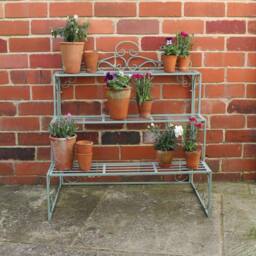 Melody Maison Sage Green Metal Three Tier Plant Theatre Stand in Dark Blue - thumbnail 3