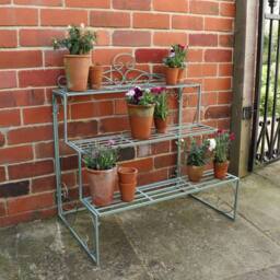 Melody Maison Sage Green Metal Three Tier Plant Theatre Stand in Dark Blue - thumbnail 2