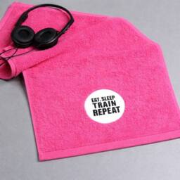 Duncan Stewart Eat, Sleep, Train, Repeat Gym Towel in Pink - thumbnail 1