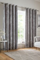 Catherine Lansfield 'Crushed Velvet' Lined Eyelet Curtains in Silver - Size: 168 cm width x 183 cm drop - thumbnail 1
