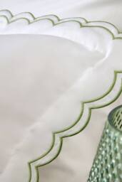 CHRISTY Scallop Edge Cotton Sateen Oxford Pillowcases in Green - thumbnail 2