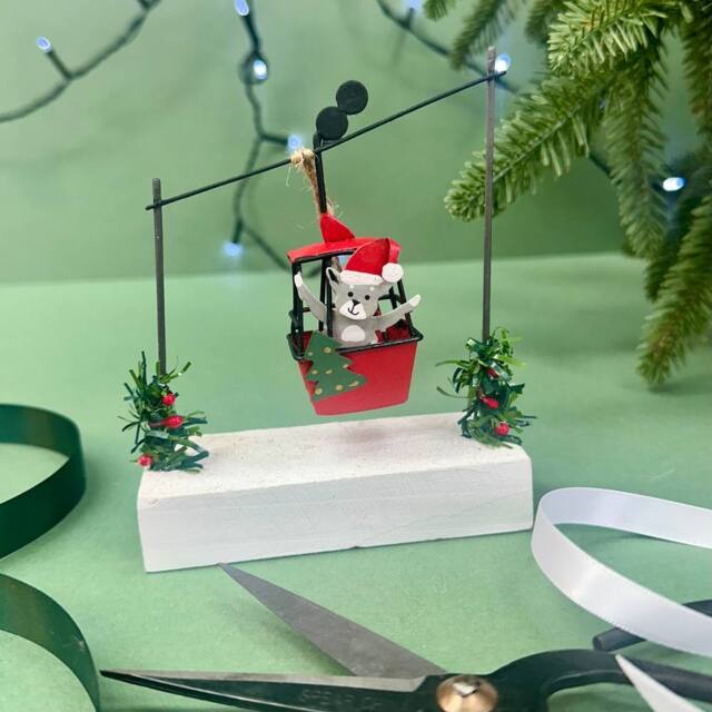 The Alphabet Gift Shop Cat In Cable Car Christmas Decoration in Red