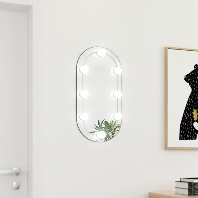 Berkfield Home Mirror with LED Lights 60x30 cm Glass Oval in Silver - image 1