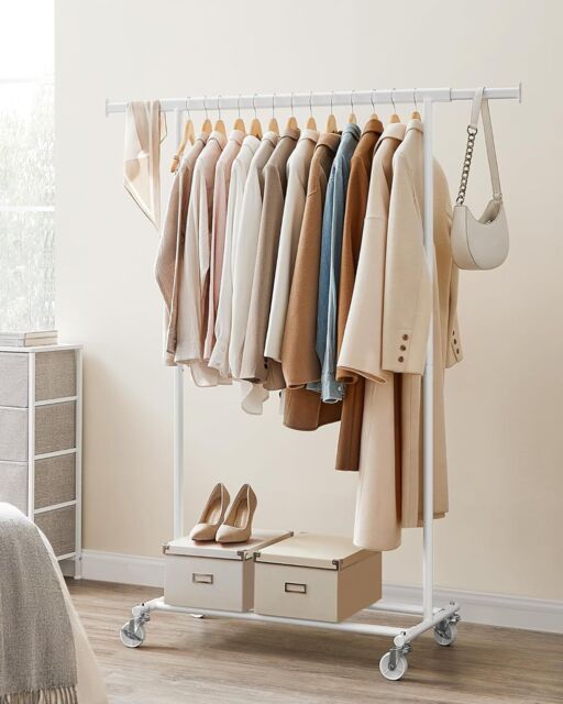 SONGMICS Portable Clothes Rack on Wheels with Extendable Rail in White - image 1