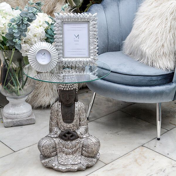 Madison & Mayfair Silver Sitting Buddha Side Table with a Clear Glass Top - image 1