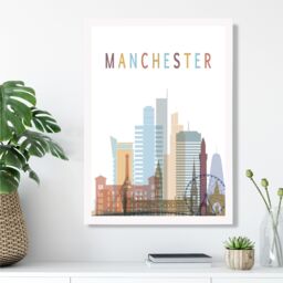 ARTZE Manchester Colourful City Skyline Framed Print SIZE: A4 with White Frame in Pale Blue - thumbnail 2
