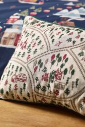 Catherine Lansfield 'Christmas Ski Village' Embroidered Cushion in Natural - Size: 30 cm x 50 cm - thumbnail 2