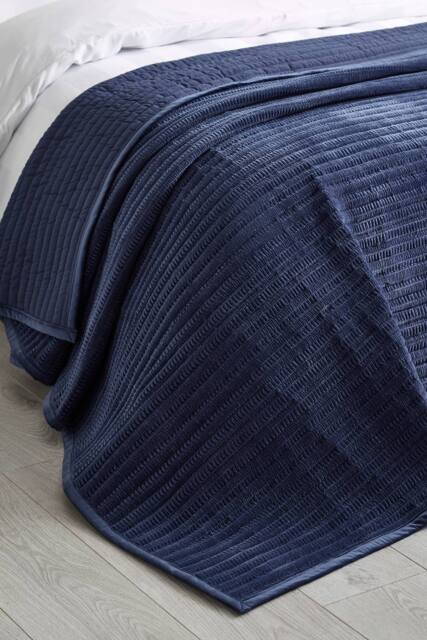 Catherine Lansfield 'Velvet Pinsonic' Quilted Bedspread in Navy - image 1