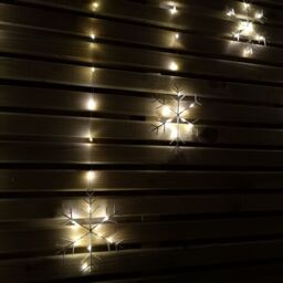 Samuel Alexander 1.2m Battery Operated Snowflake Christmas Curtain Lights with 147 Warm White LEDs in Beige - thumbnail 3