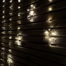 Samuel Alexander 1.2m Battery Operated Snowflake Christmas Curtain Lights with 147 Warm White LEDs in Beige - thumbnail 2