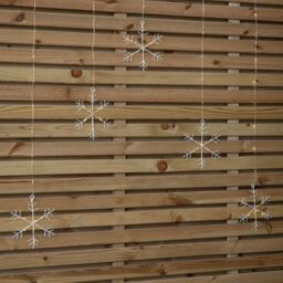 Samuel Alexander 1.2m Battery Operated Snowflake Christmas Curtain Lights with 147 Warm White LEDs in Beige - thumbnail 7