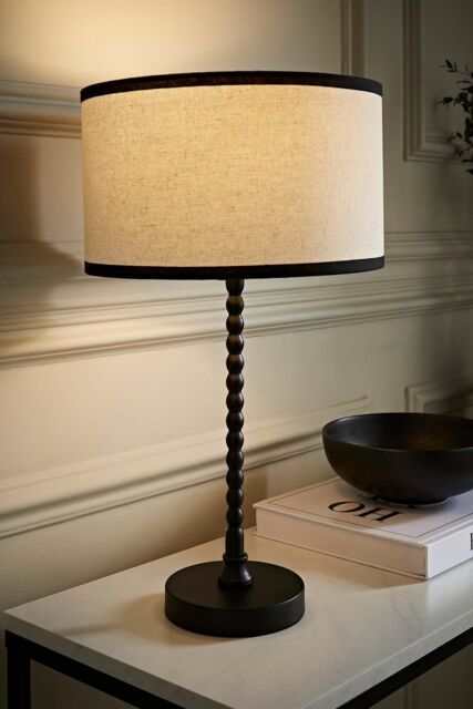 ValueLights Maeve Natural Linen Black Trim Drum Shade Matte Black Bobbin Bobble Table Lamp - image 1