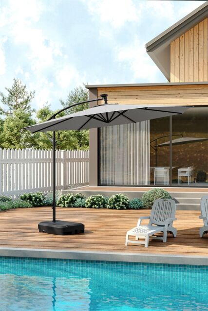 Living and Home Outdoor 32 LED Lighted Patio Umbrella with Crank Lift System with Base in Light Grey - image 1