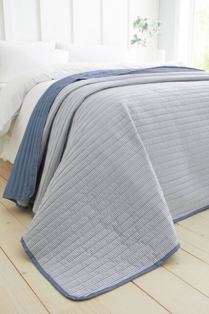 Catherine Lansfield 'Stripe' Quilted Reversible Bedspread in Blue - image 1