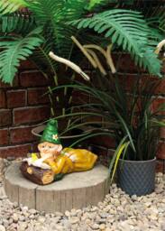 St Helens Female Gnome Lying by a Log in Green - thumbnail 2