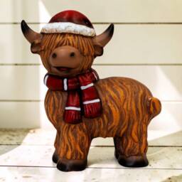 Four Candle Terracotta Highland Cow Christmas Figurine with Santa Hat in Brown - thumbnail 2