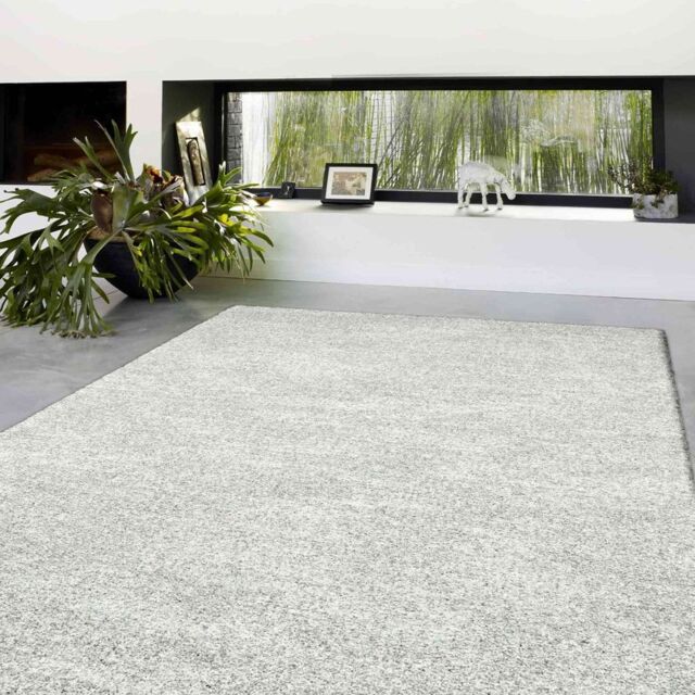 The Rug Shop UK Cream Modern Easy to clean Machine Made Plain Area Rug - Size: 160 cm x 230 cm - image 1