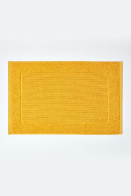 Homescapes Imperial Plain Cotton Bath Mat in Yellow - image 1