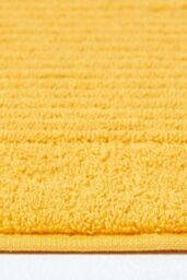 Homescapes Imperial Plain Cotton Bath Mat in Yellow - thumbnail 3