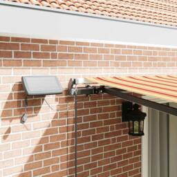 Berkfield Home Manual Retractable Awning with LED Yellow & Orange 450x350 cm - thumbnail 4