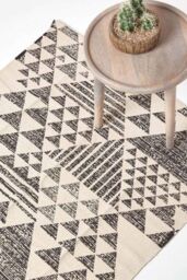 Homescapes Delphi Geometric Style 100% Cotton Printed Rug in Black - Size: 120 cm x 170 cm - thumbnail 1
