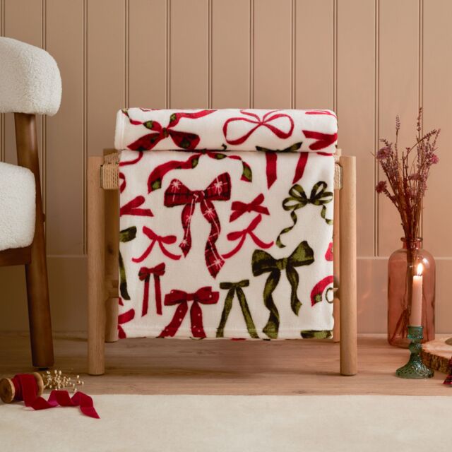 Furn Festive Bows Printed Fleece Throw in White - Size: 140 cm x 180 cm - image 1