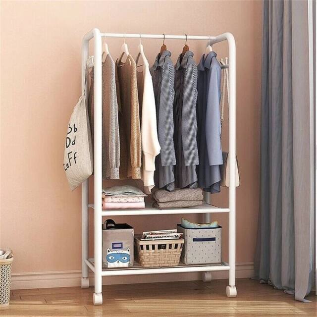 KORVIXA 2 Tier Metal Rolling Clothing Garment Rack in White - image 1