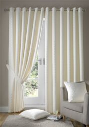 Luxury Living Adi Lined Ring Top Eyelet Curtains in Cream - Size: 168 cm width x 137 cm drop - thumbnail 1
