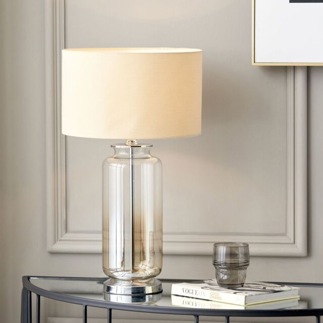 Ruma Glass Cylinder Table Lamp With Gold Detail & White Lampshade in Cream - image 1